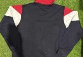 Red, white, and blue hoodie with hood. Free home delivery in all of Pakistan.